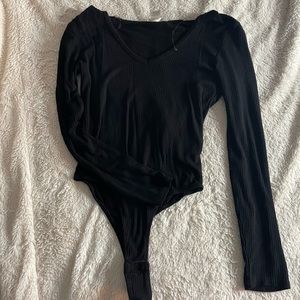 Black long sleeve ribbed body suit